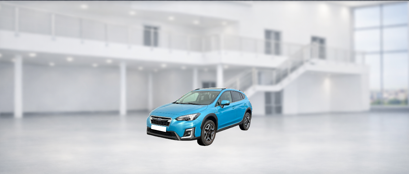 SUBARU XV Voiture compacte bleue stationnée dans un showroom moderne à l'intérieur.